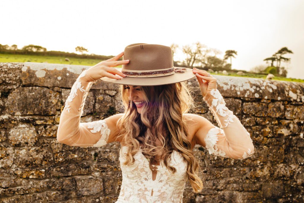 Bride wearing a cowboy hat