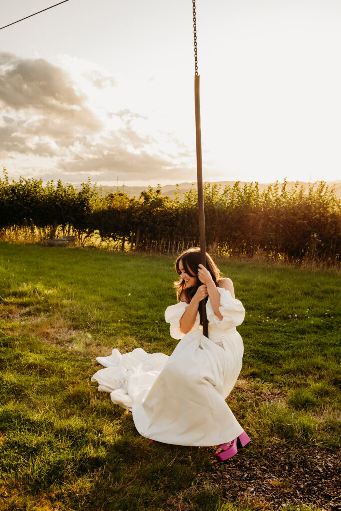 Bride in a white dress on a zipwire