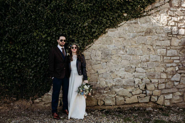 Bride and Groom in cool outfits and sunglasses