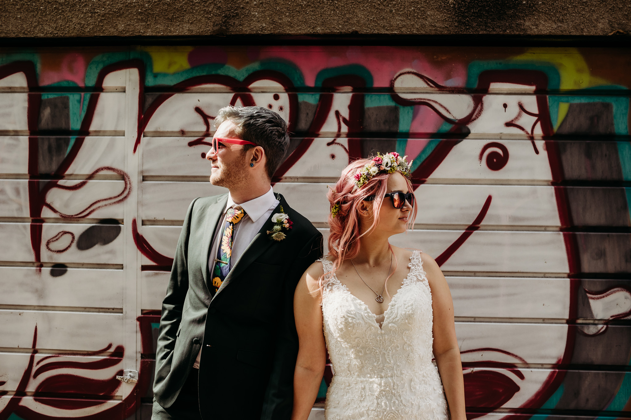 Colourful Bristol Wedding - Bride and Groom in front of graffiti